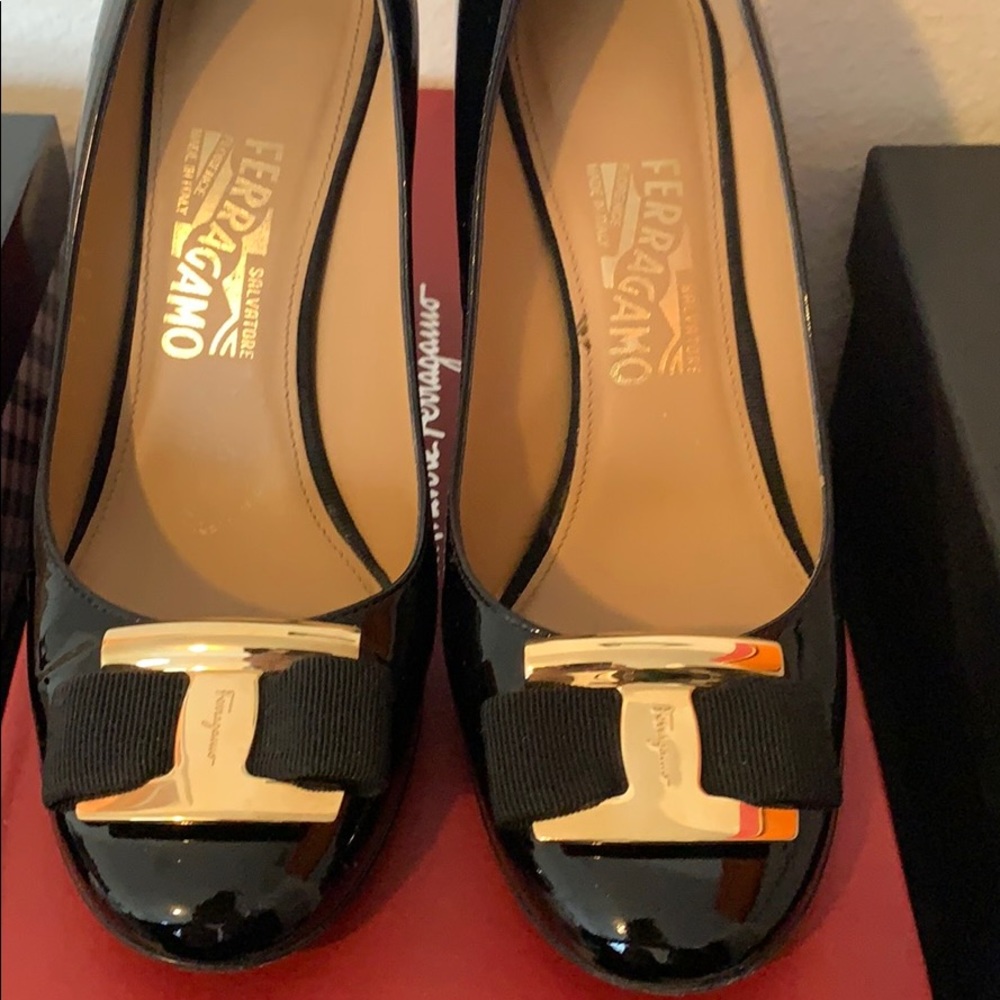 Black patent. Made in Italy.